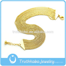 TKB-JB0171 Preciosa joya para mujer de oro con ocho cadenas con forma de caja y una pequeña campana. Pulseras y brazaletes de acero inoxidable 316L.